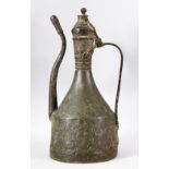 A ISLAMIC / TURKISH BRASS EMBOSSED EWER / COFFEE POT - carved with flora, 41cm high