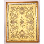 A CHINESE EMBROIDERED FRAMED TEXTILE - upon a mustard yellow ground with embroidered floral display,