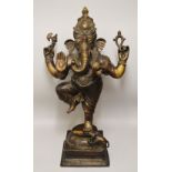 A LARGE AND HEAVY 18TH / 19TH CENTURY INDIAN BRONZE FIGURE OF GANESH - the multi arm deity stood