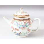 A CHINESE FAMILLE ROSE PORCELAIN TEAPOT AND COVER, painted with a cherry tree and a wall and temple,