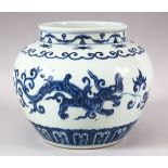 A CHINESE MING STYLE BLUE & WHITE PORCELAIN JAR - decorated with chilong and foliage - six character