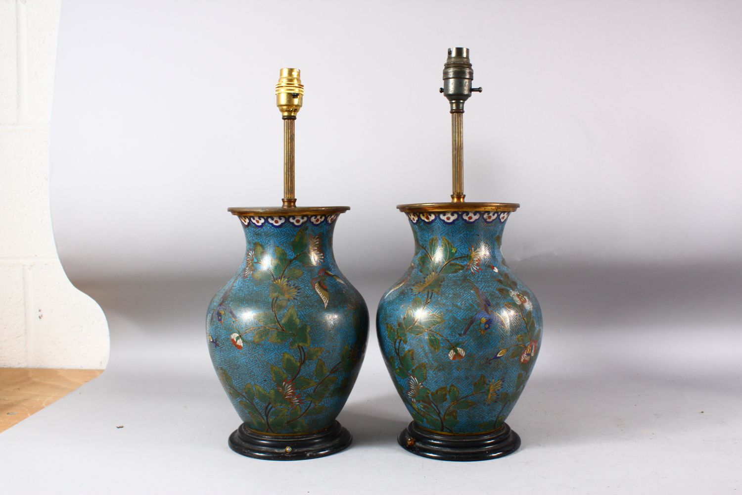 A PAIR OF CHINESE BLUE GROUND CLOISONNE VASES / LAMPS, decorated with native flora, butterflies - Image 2 of 6