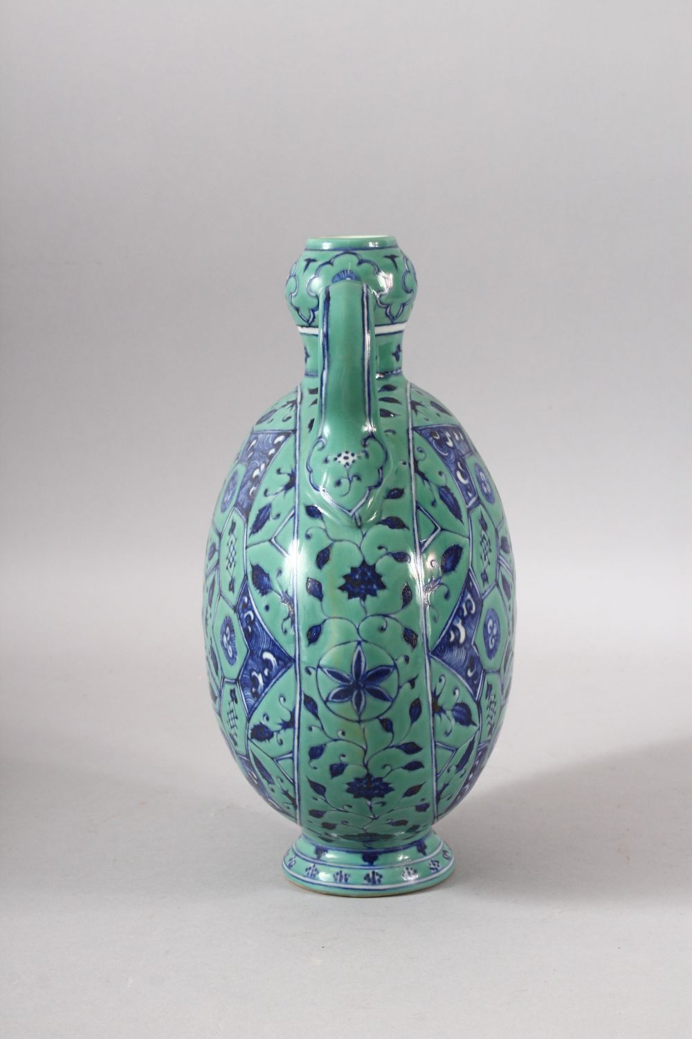 A CHINESE TURQUOISE GROUND TWIN HANDLE PORCELAIN MOON FLASK - the body decorated with geometric - Image 2 of 7