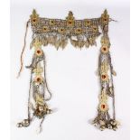 AN ISLAMIC CEREMONIAL NECKLACE, with hanging bells.