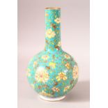 A GOOD DECORATIVE CHINESE TURQUOISE GROUND ENAMEL VASE, with flowers and foliate design, 22.5cm