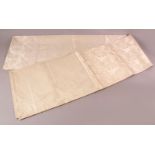 A FINE JAPANESE SILK EMBROIDERED FUKURO OBI TIE - the silk with a white ground depicting phenix