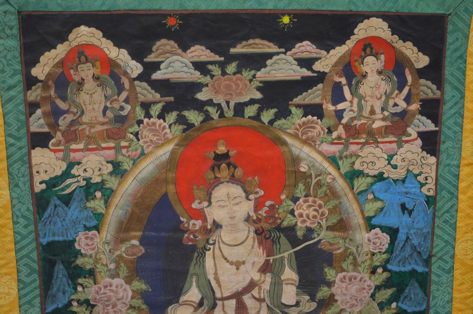 A GOOD LARGE 20TH CENTURY TIBETAN THANKA, mounted and framed, 120cm x 100cm. - Image 3 of 6