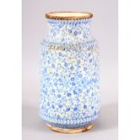 A GOOD IZNIK BLUE & WHIITE POTTERY ALBERELLO - decorated with scrolling blue foliage - 21cm