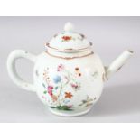 A CHINESE QIANLONG FAMILLE ROSE PORCELAIN TEA POT & COVER - decorated with native floral displays,