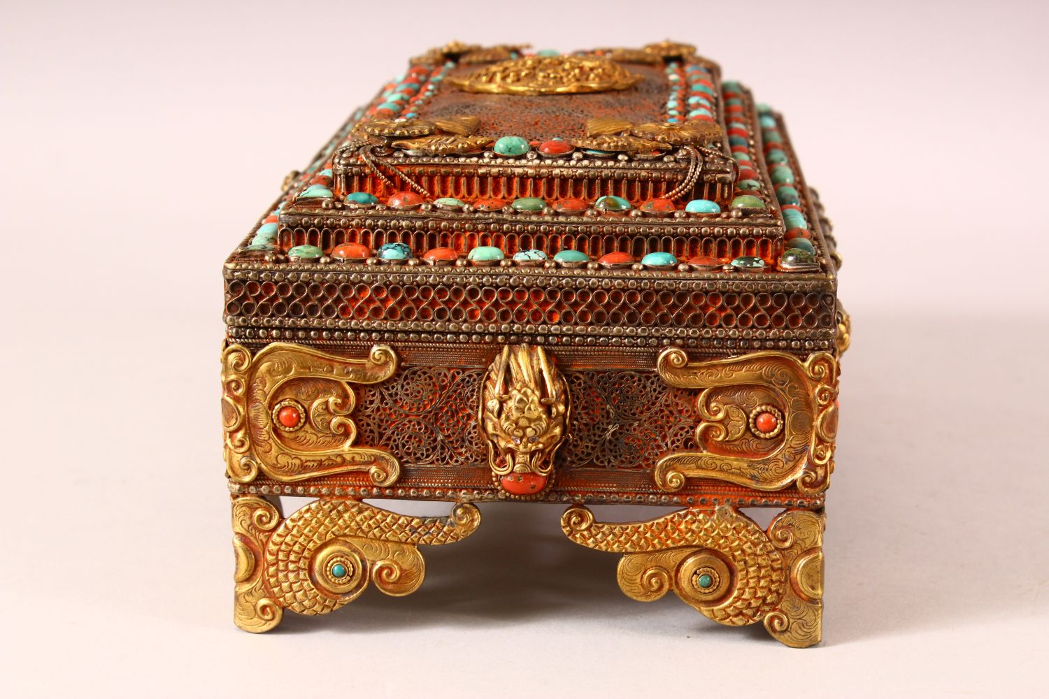 A TIBETAN MOUNTED AND INLAID METAL CASKET, the body with openwork style inlay, with gilt raised - Image 2 of 7