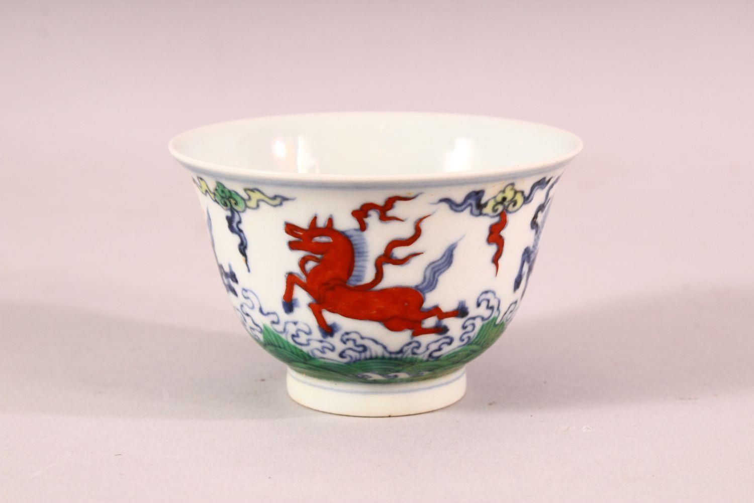 A CHINESE DOUCAI PORCELAIN HORSE CUP - depicting four horses amongst clouds, the base with a 6 - Image 2 of 7