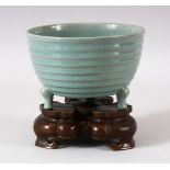 A GOOD CHINESE CELADON TRIPOD CENSER & BRONZE STAND - the censer with tripod feet and a natural