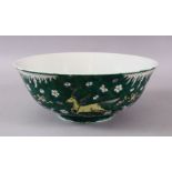 A 19TH / 20TH CENTURY CHINESE FAMILEL VERTE PORCELAIN BOWL, Decorated with horses uopn a wave ground