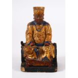 A GOOD 18TH / 19TH CENTURY CHINESE CARVED WOOD & LACQUERED SEATED FIGURE - the figure seated in