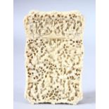 A GOOD CHINESE CANTON CARVED IVORY CARD CASE, carved with figures in a busy landscape, 10.5cm x 6.