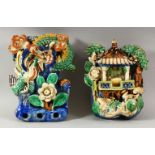 TWO CHINESE POLYCHROME POTTERY WALL POCKETS, carved with a shrine and flora with ducks / birds, 20cm