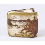 A JAPANESE MEIJI PERIOD SILVER & MIXED METAL CIGARETTE CASE - The exterior with native landscape