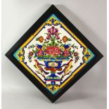 A 19TH CENTURY PERSIAN QAJAR TILE PANEL, comprising four square tiles forming a picture depicting an