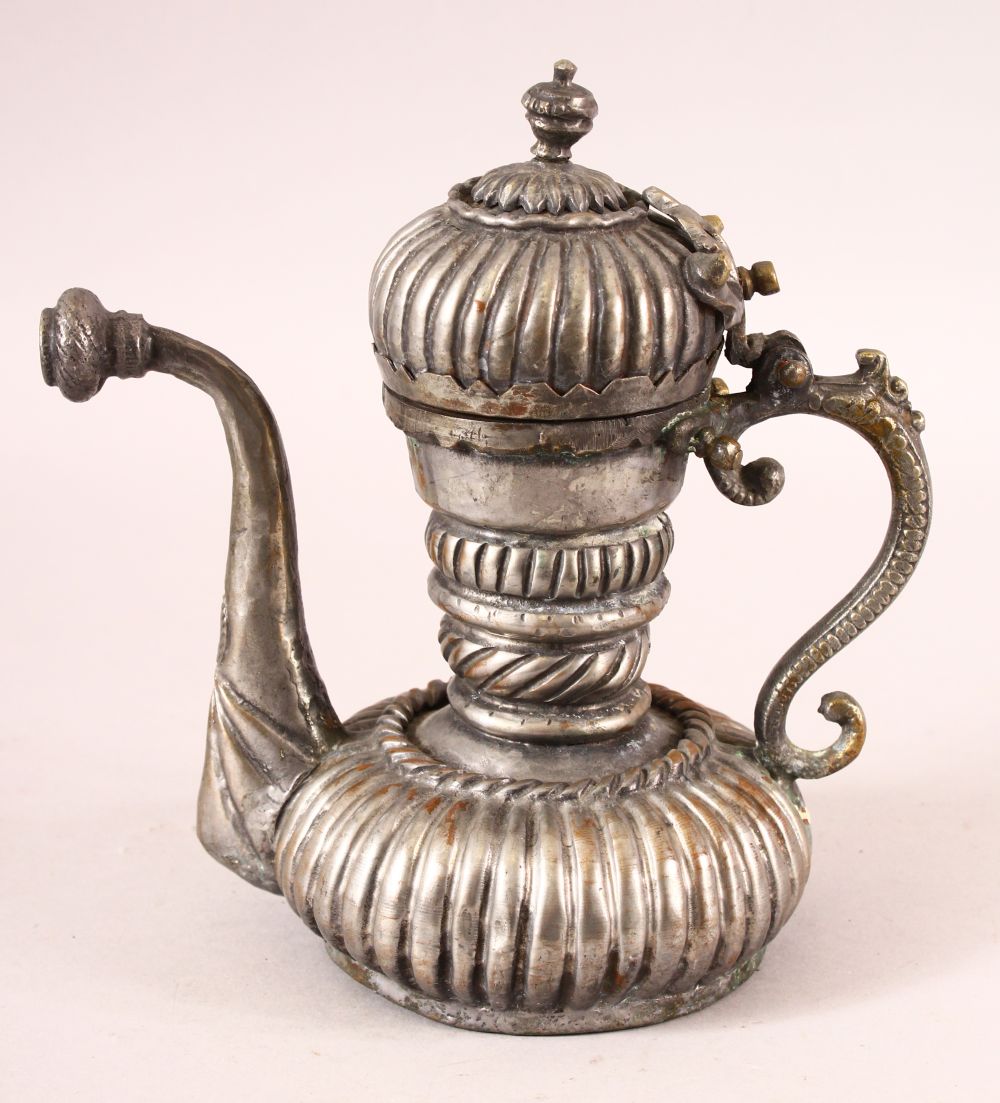 A TURKISH OTTOMAN TINNED COPPER LIDDED EWER, 20cm high.