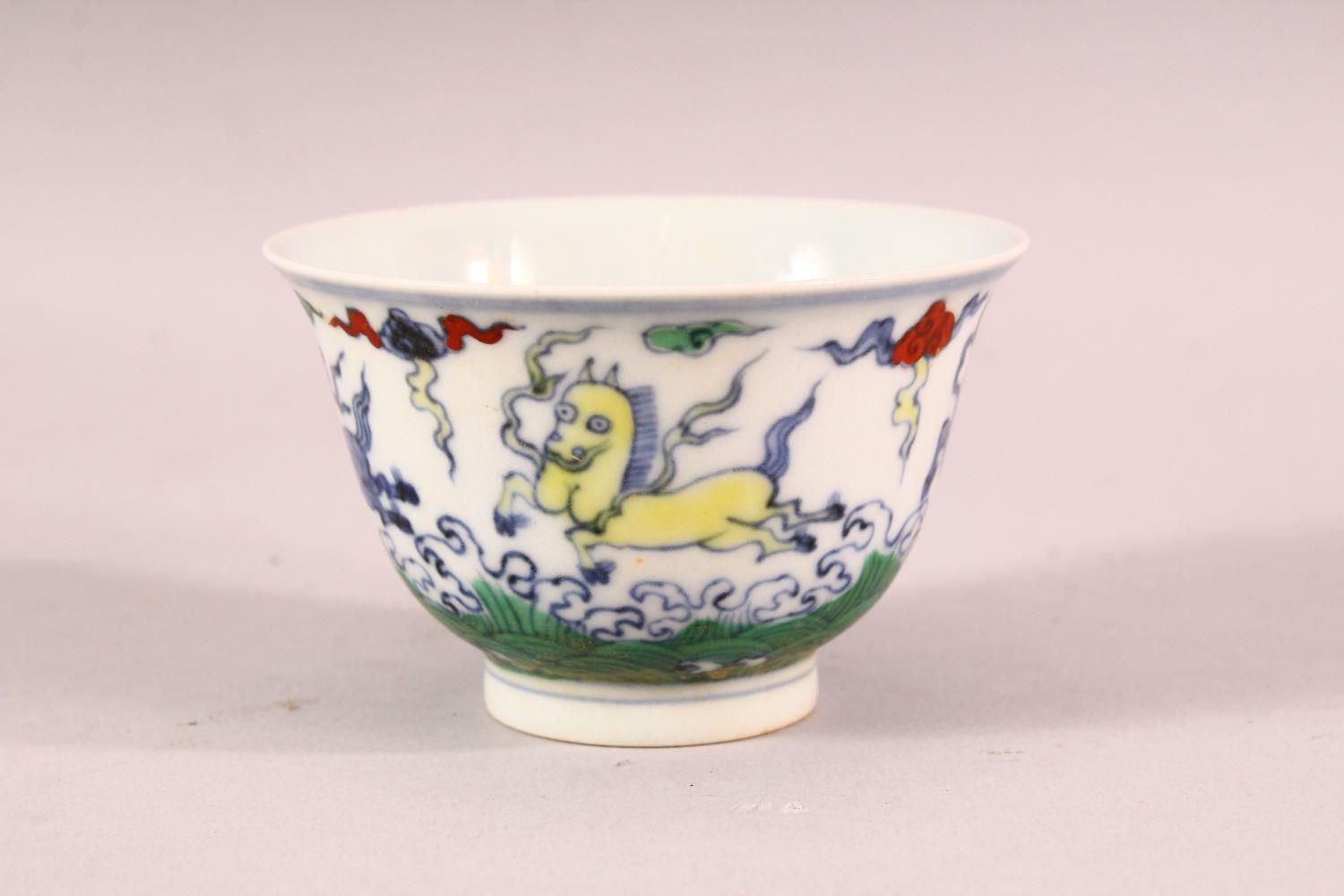 A CHINESE DOUCAI PORCELAIN HORSE CUP - depicting four horses amongst clouds, the base with a 6 - Image 4 of 7