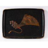 A JAPANESE MEIJI PERIOD LACQUER TRAY - decorated with a landscape view fan and tassel- 34cm x 24cm