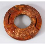 A CHINESE CARVED JADE DOUBLE RING - carved in archaic style - 11.5cm