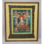 A GOOD LARGE 20TH CENTURY TIBETAN THANKA, mounted and framed, 120cm x 100cm.