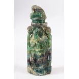 A CHINESE CARVED GREEN HARD STONE LIDDED VESSEL - carved with scenes of birds, 22.5cm