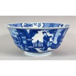 A GOOD CHINESE BLUE AND WHITE KANGXI BOWL, the centre painted with boys playing, the sides with