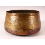 A 16TH CENTURY MAMLUK COPPER BOWL, with engraved decoration and calligraphy, 27cm diameter.