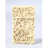 A GOOD CHINESE CANTON CARVED IVORY CARD CASE, carved with figures in a busy landscape, 9.5cm x 5.