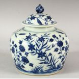 A CHINESE BLUE AND WHITE PORCELAIN JAR AND COVER, the body decorated with floral sprays, overall