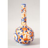 A SMALL IMARI STYLE PORCELAIN BOTTLE VASE, 16cm high.