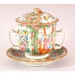 A CHINESE CANTON TWIN HANDLE ECUELLE, COVER AND SAUCER, painted with panels of figures, birds and