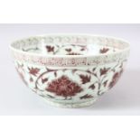 A CHINESE PORCELAIN IRON RED FLOWER BOWL, the interior and exterior painted with numerous flowers,