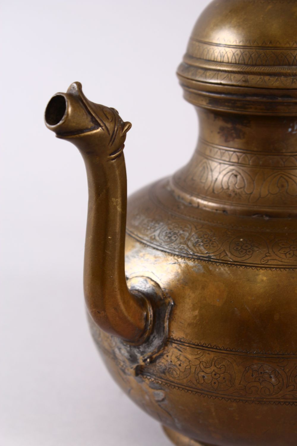 AN 18TH CENTURY MUGHAL INDIAN BRASS EWER, with animal formed handle and spout, 22cm high. - Image 3 of 6