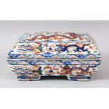 A CHINESE MING STYLE WUCAI PORCELAIN RECTANGLAR BOX AND COVER, painted with dragons and phoenix, the