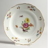 A PAIR OF 19TH CENTURY MEISSEN CIRCULAR PLATES, painted with flowers and insects. Cross swords