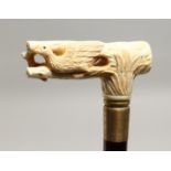 A WALKING STICK with bone EAGLE handle 36ins long.