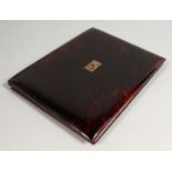 A VICTORIAN TORTOISESHELL BLOTTER with gold initials. 10.5in x 8.5ins.