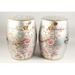 A PAIR OF CHINESE SILVER BARREL SEATS with birds 18ins high.