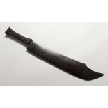 A CARVED WOOD MODEL OF A KNIFE 19.5 ins long