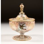 A GOOD GLASS CIRCULAR BOWL AND COVER with gilt decoration and white enamel painted with birds. 3.