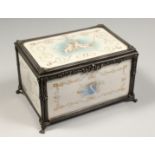 A VERY GOOD 19TH CENTURY IVORY JEWEL BOX painted with cherubs with silver mounts on claw feet,
