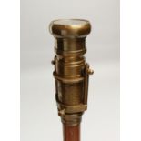A NOVELTY WALKING STICK with COMPASS handle. 38ins long.