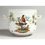 A 19TH CENTURY AUGUSTUS REX TWO HANDLED JARDINERE painted with birds and encrusted with flowers Mark
