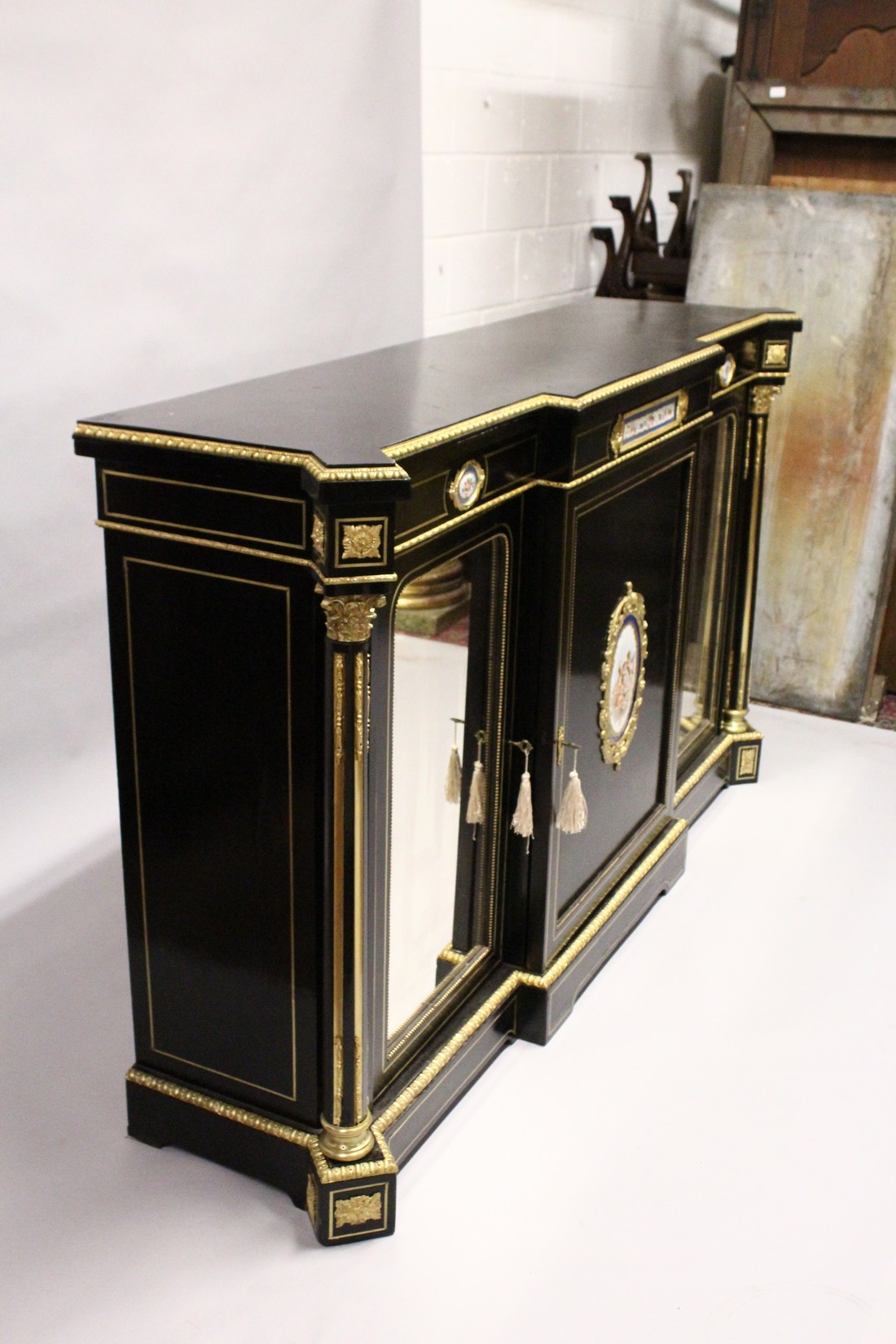 A VERY GOOD 19TH CENTURY FRENCH EBONY BREAK FRONT CREDENZA, with ornate mounts inset with Sevres - Image 3 of 6