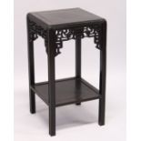 A GOOD CHINESE REDWOOD SQUARE TOP STAND with cross-banded top and under tier. 1ft 5ins square, 2ft