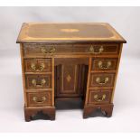 A GOOD EDWARDIAN MAHOGANY SATINWOOD BANDED AND INLAID KNEEHOLE DESK, with an inlaid rectangular top,