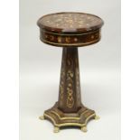 A FRENCH STYLE MAHOGANY AND MARQUETRY DRUM TABLE, on a tapering hexagonal support with shaped base.